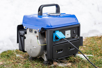 Generator in snowy area with surrounding cleared